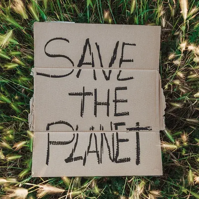 Cartellone con scritta Save the Planet